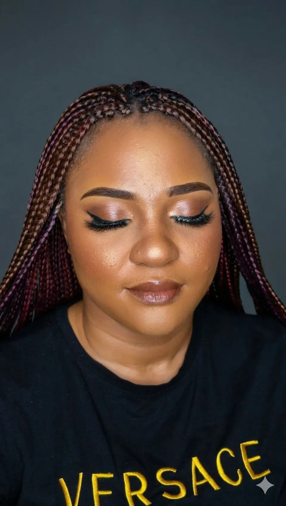 Bronze glam makeup with a winged liner and nude lip, Coon Rapids makeup artist
