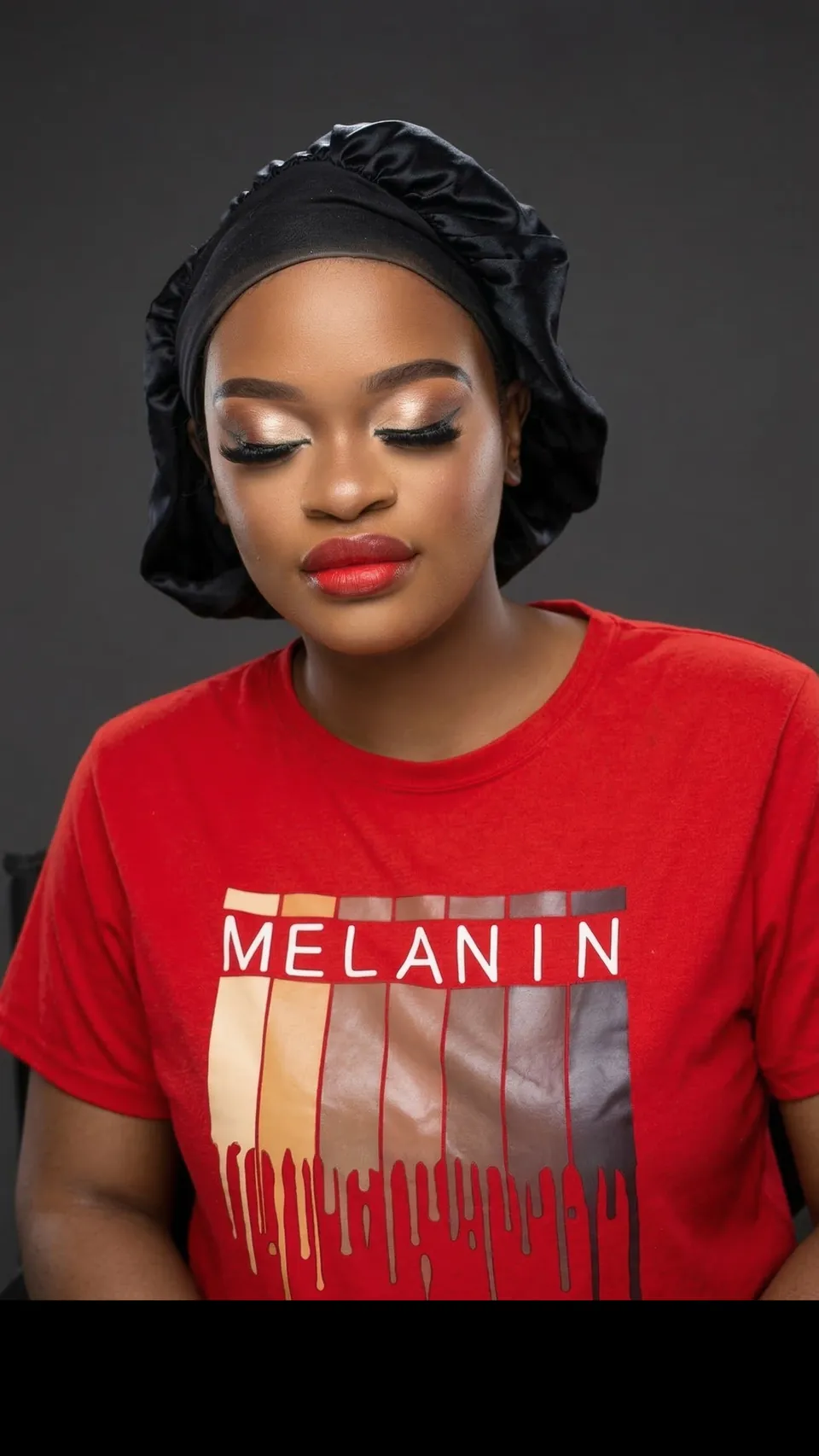 Full glam makeup with shimmer eyeshadow and a red lip by Brushed by Nora in Coon Rapids, MN