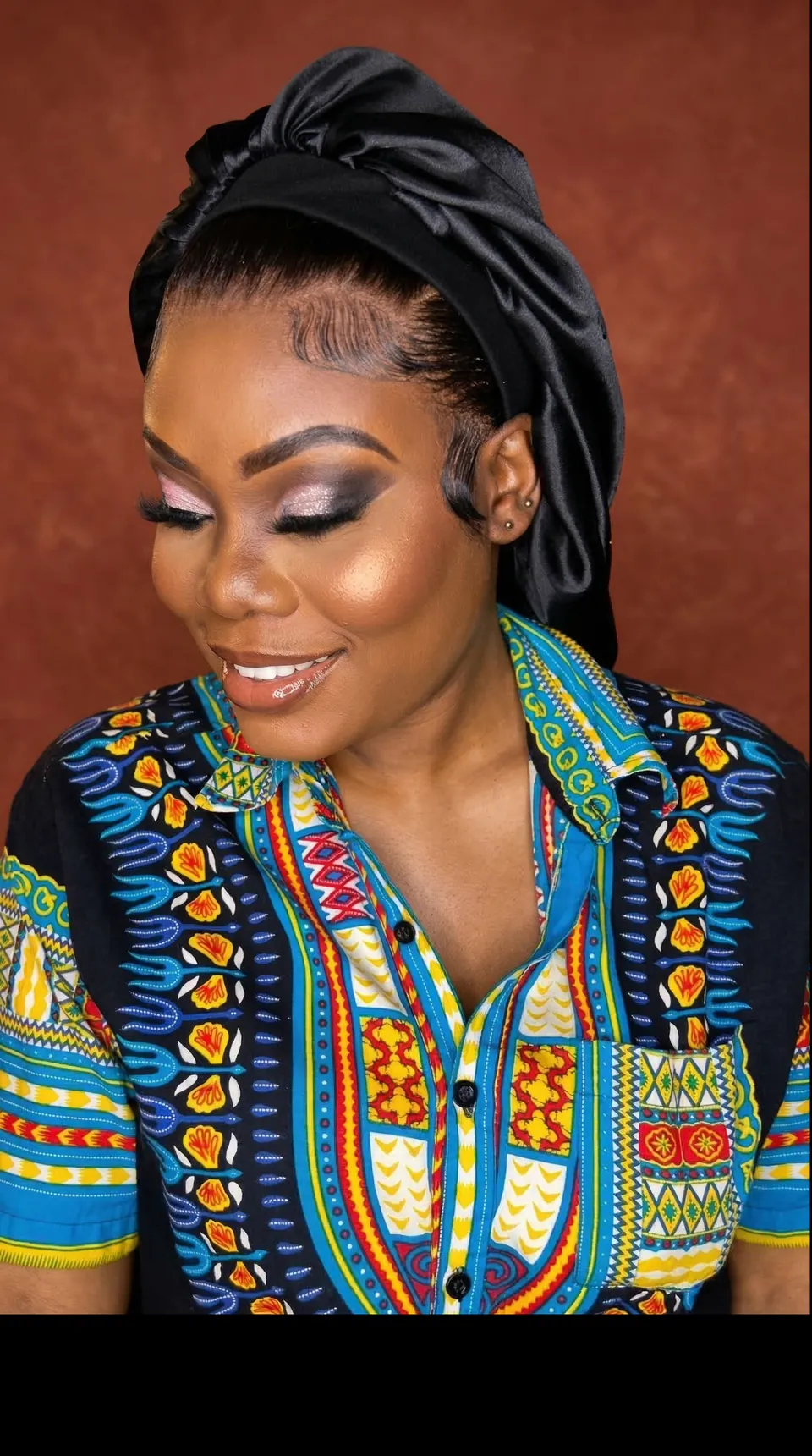 Soft glam makeup with smoky shimmer eyes and a nude-pink lip on a client from the Twin Cities